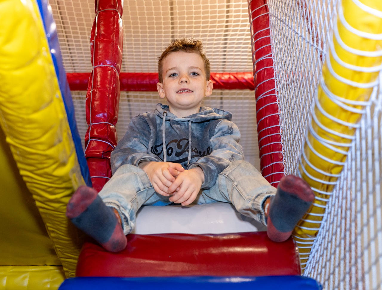 Boy enjoys play area