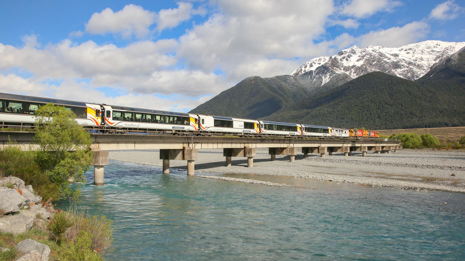OG TranzAlpine Crossing Waimariri River Bridge with snow