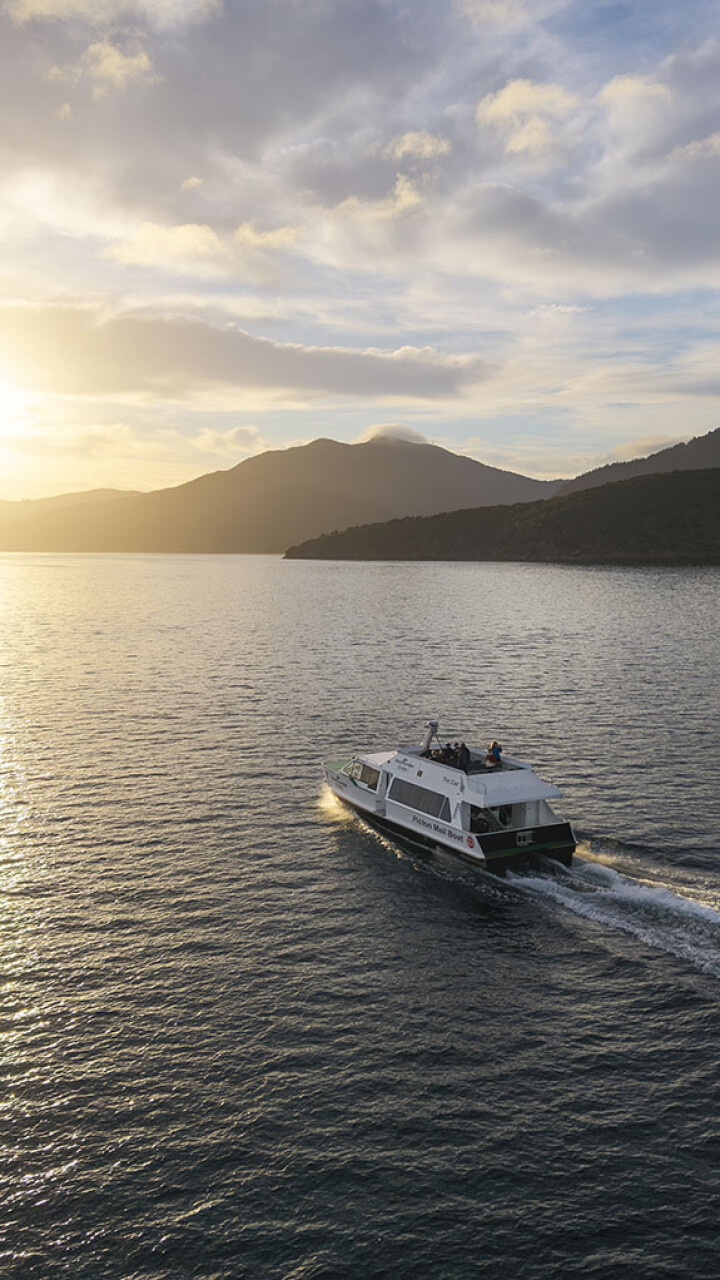 Beachcomber Cruises mailboat in the Sounds at sunset